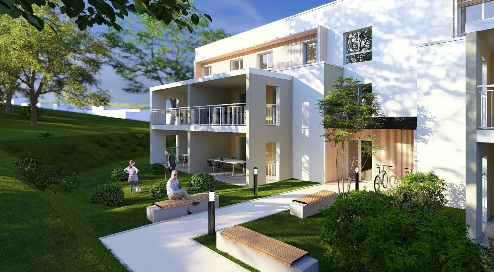 Les terrasses communes et le jardin partagé, cœur de la vie collective de la résidence.